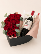 Corazón rosas y botella